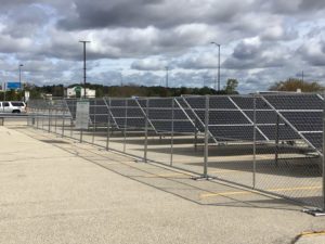 solar panels powering ev charger at austin straubel